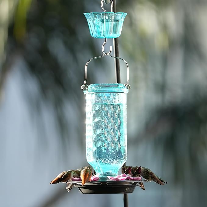 Nature’s Way Dewdrop Column Antique Teal Glass Gravity Hummingbird Feeder with Ant Moat, 23 Ounce Capacity, 6 Flexible Pink Lilac Flower Ports, Continuous Perch Ring, Easy-Clean Pewter Plastic Base