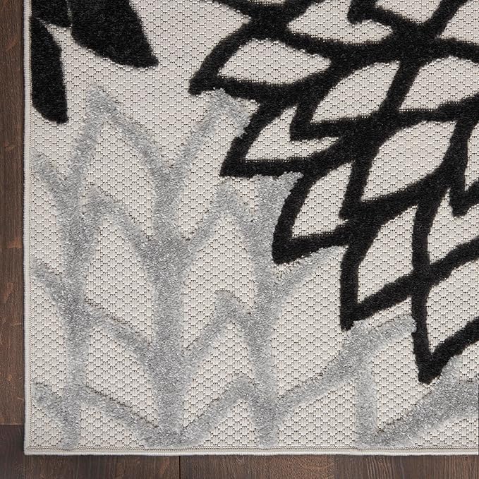 Nourison Home Aloha 114" x 156" Fabric Indoor/Outdoor Rug in Black/White Finish