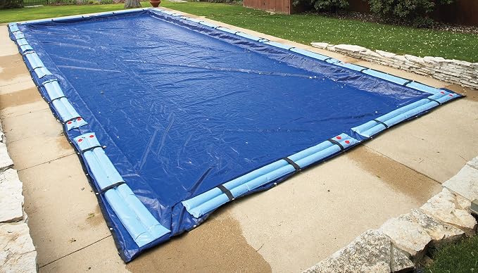 Blue Wave Gold 15-Year 18-ft x 36-ft Rectangular In Ground Pool Winter Cover | Solid polyethylene, black underside, heat-sealed seams, grommets, cable, winch, 5-ft overlap, 15-yr support, blocks debris